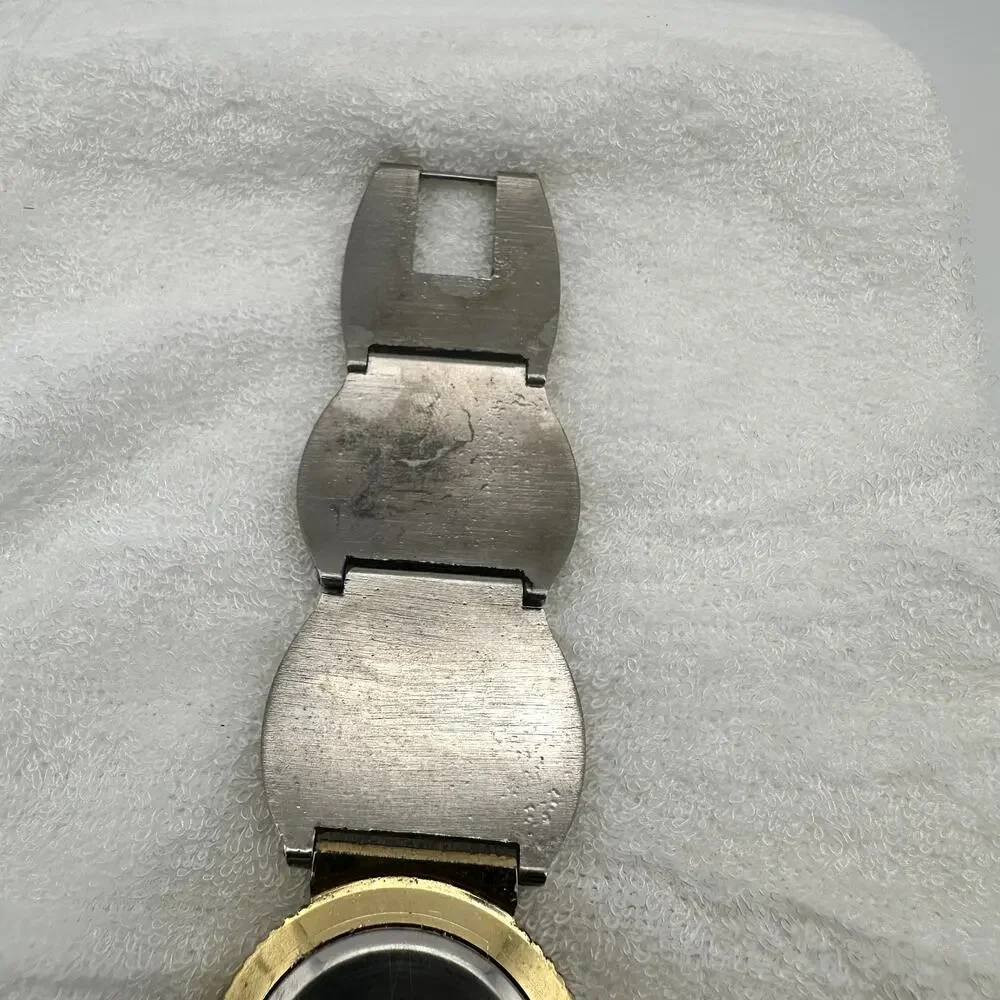 Xanadu Quartz Watch Two Tone Gold Silver Ornate Link Bracelet Black Dial
